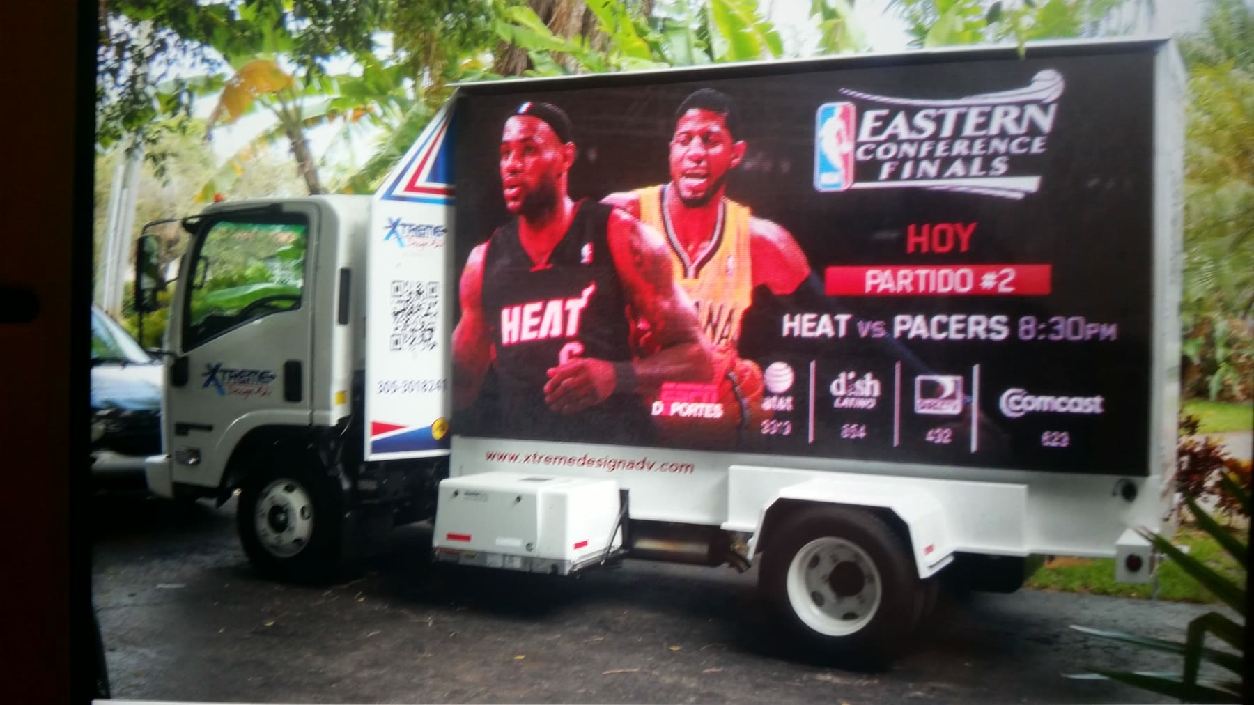 Mobile LED billboard truck displaying a Miami Heat game advertisement